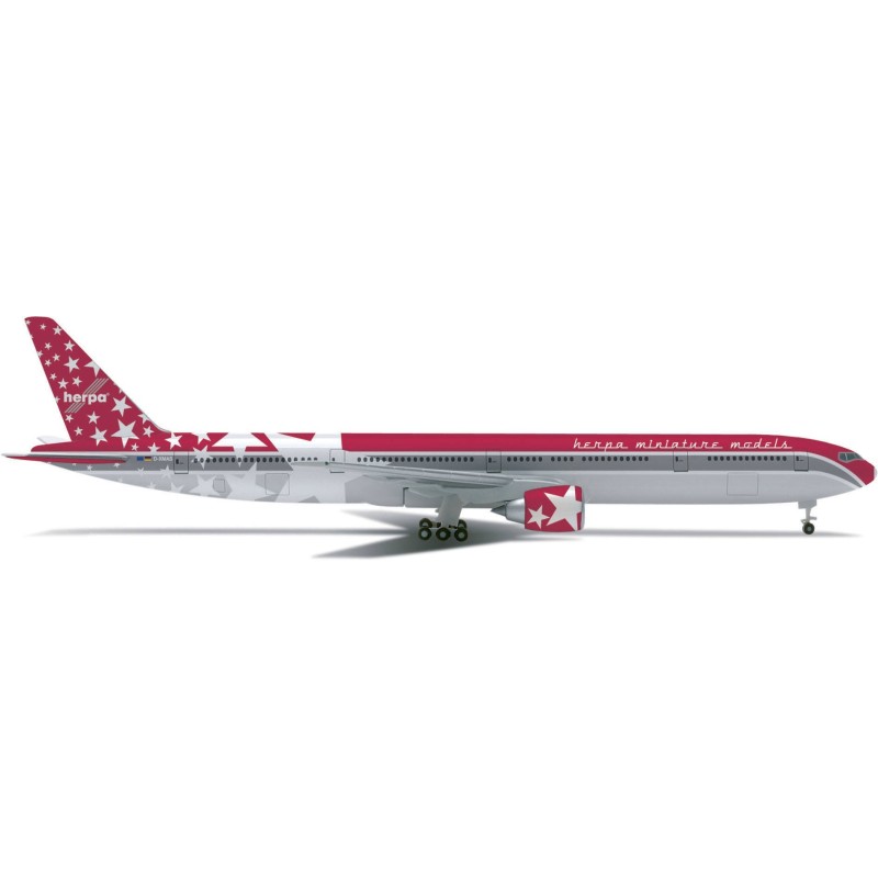 Model redukcyjny Boeing 777-300ER, skala 1:500, Herpa, malowanie świąteczne z gwiazdami.
