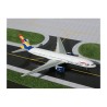Model redukcyjny Boeing 777-200, skala 1:400, GeminiJets. Biały kadłub z logo British Airways.