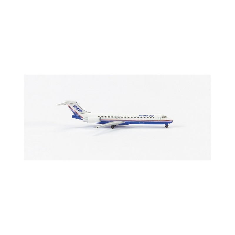 Model redukcyjny Boeing 717-200, skala 1:500, Herpa. Biały kadłub, niebieskie i czerwone paski, logo linii lotniczych.