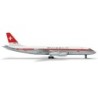 Model redukcyjny Swissair Douglas DC-8-50, skala 1:500, HERPA. Biały kadłub, czerwone paski, logo Swissair.