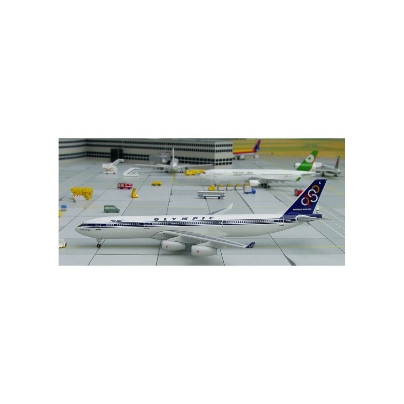 Model redukcyjny Airbus A340-300 Olympic, skala 1:500. Biały kadłub, niebieski ogon z logo Olympic.