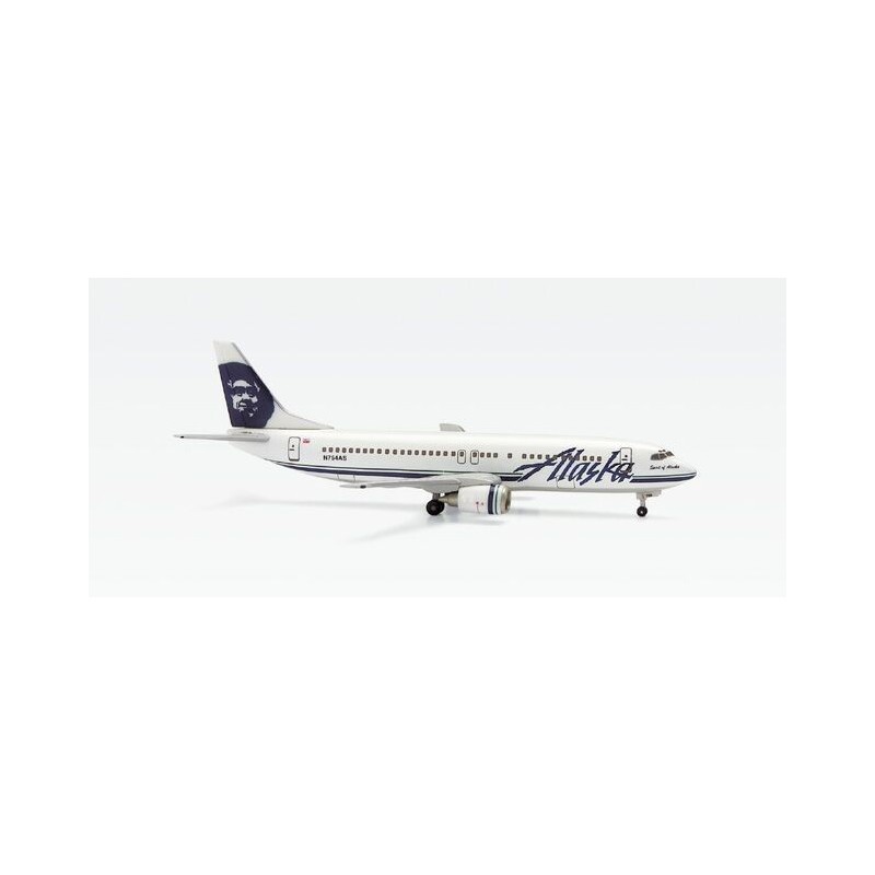 Model redukcyjny Boeing 737-400 Alaska Airlines, skala 1:400, HERPA. Biały kadłub z niebieskim malowaniem i logo.