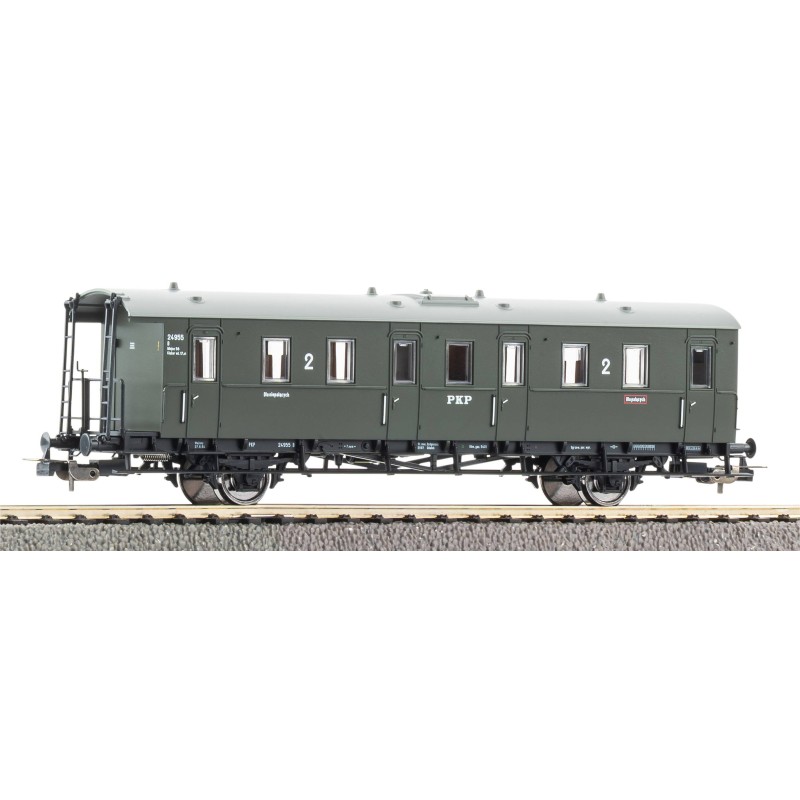 Wagon przedziałowy 2 klasy PKP PIKO 53136 H0, epoka III, przezroczyste okna, szczegółowe wnętrze i historyczne oznaczenia.