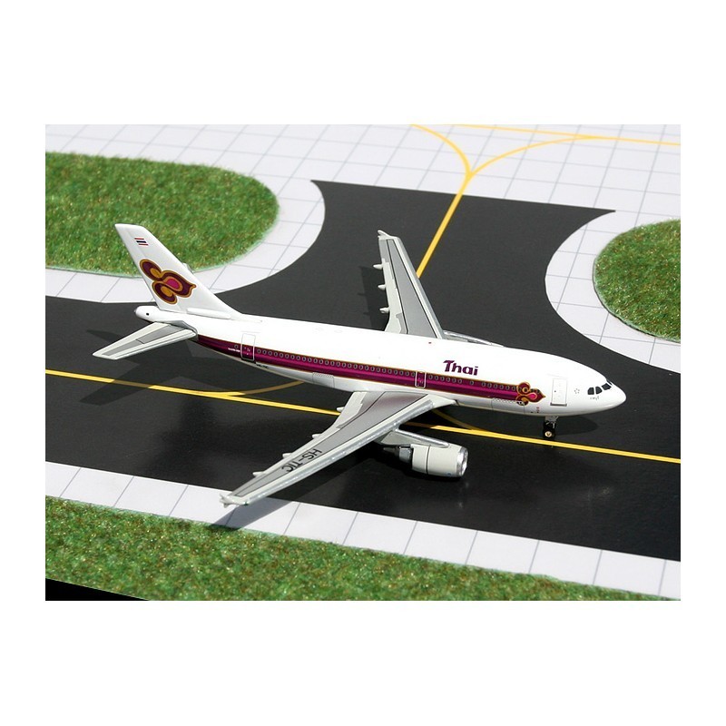 Model redukcyjny Airbus A310, skala 1:400, GeminiJets. Biały kadłub, malowanie linii Thai.