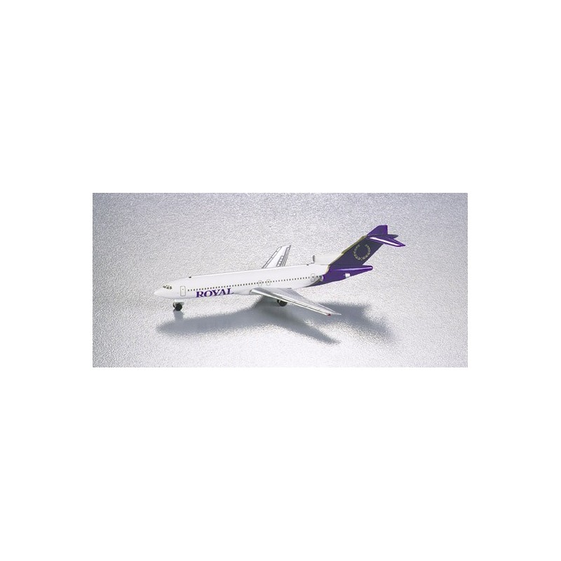 Model redukcyjny Boeing 727-200 Royal Aviation, skala 1:500, HERPA. Biały kadłub, purpurowy ogon i napis "ROYAL".