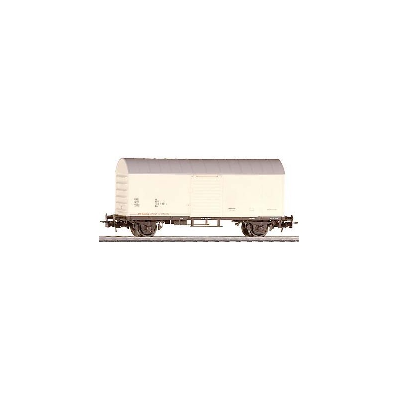 Model wagonu towarowego RENT A WAGON, skala H0, kremowy z szarym dachem.