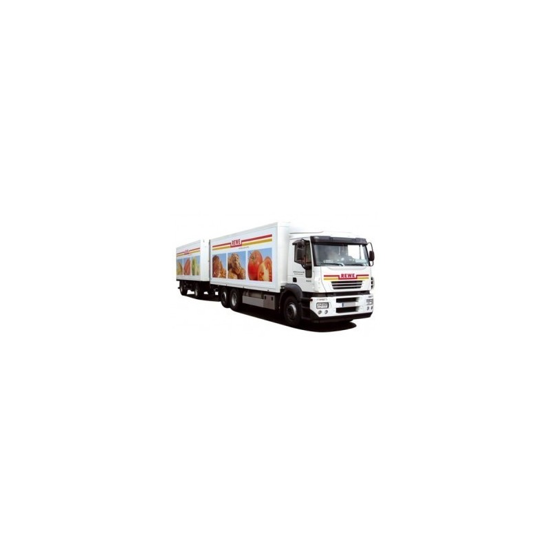 Model redukcyjny Iveco Stralis KHZ, skala 1:87, AWM. Biały samochód ciężarowy z logo REWE i zdjęciami produktów spożywczych.