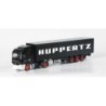 Mercedes-Benz Actros L "Huppertz", skala 1:87, HERPA. Czarny ciągnik siodłowy z naczepą, logo "Huppertz".