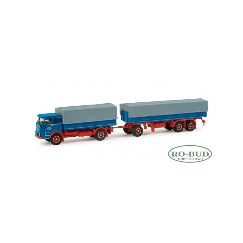 Büssing LU 11/16 "Hoffmann Nutzfahrzeuge", skala 1:87, HERPA. Niebieski ciągnik siodłowy z czerwonymi detalami i szarą plandeką.