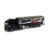 Mercedes-Benz Axor silo semitrailer "Christmas 2005", skala 1:87, Herpa. Czarny, z grafiką świąteczną.