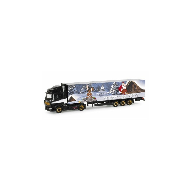 Model redukcyjny Renault Premium, skala 1:87, Herpa. Czarny ciągnik siodłowy z naczepą, dekoracja świąteczna 2007.