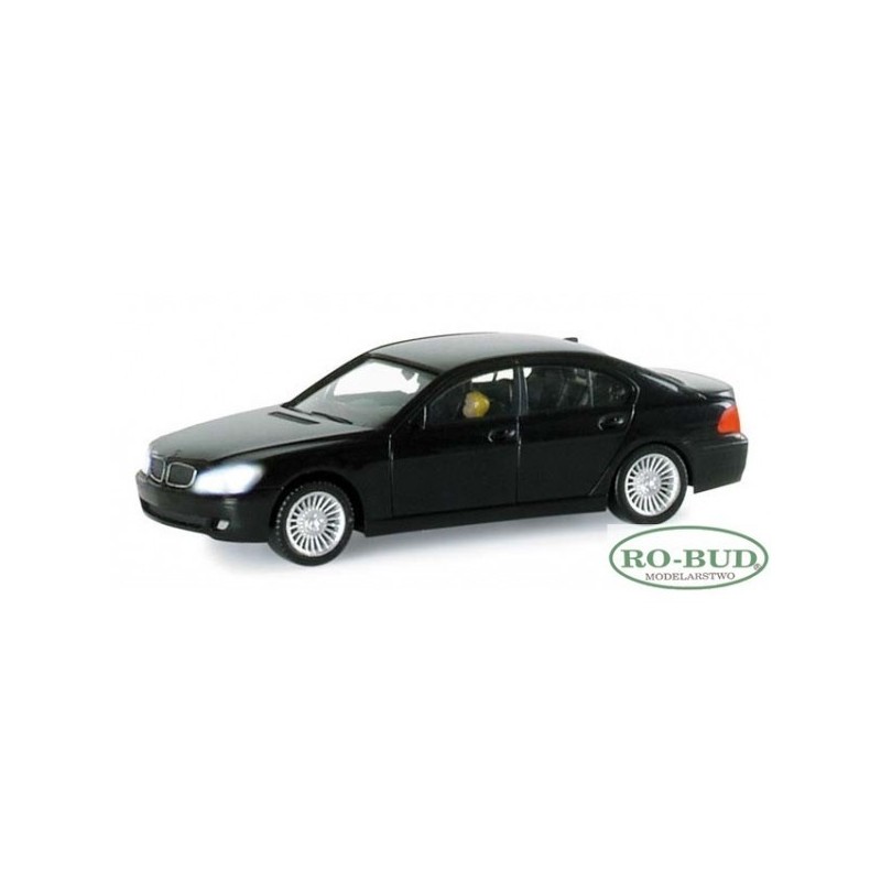 Model redukcyjny BMW 7 facelift, skala 1:87, HERPA. Czarny samochód z oświetleniem.
