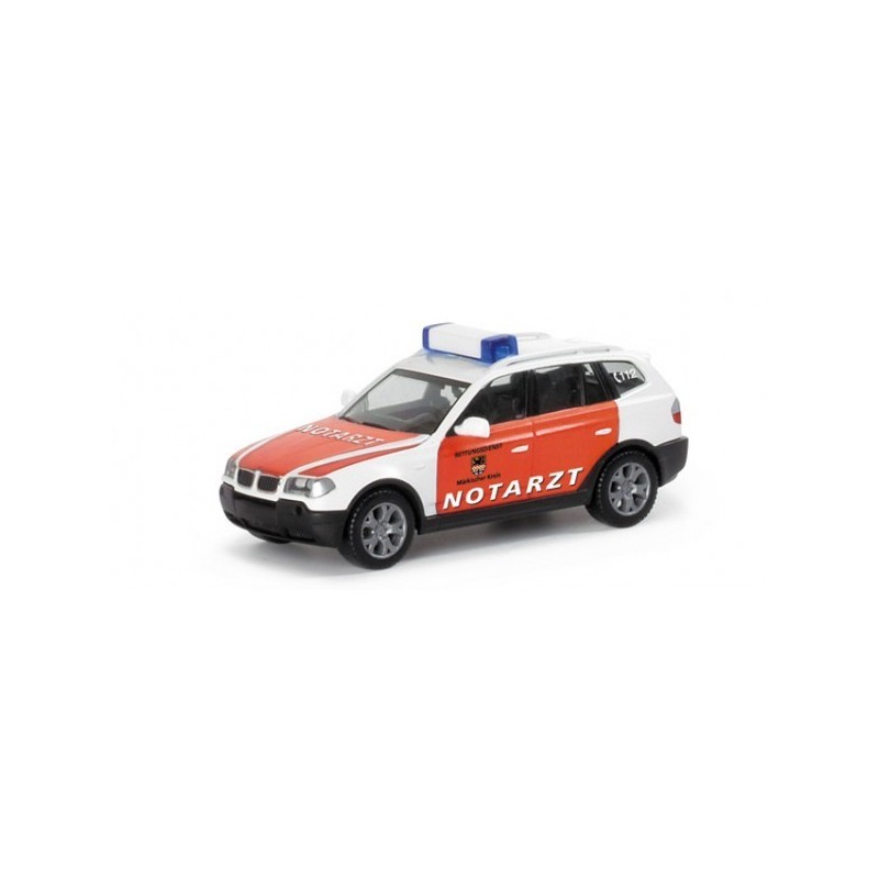 Model redukcyjny BMW X3S, skala 1:87, Herpa. Biały i czerwony samochód ratunkowy z sygnalizacją.