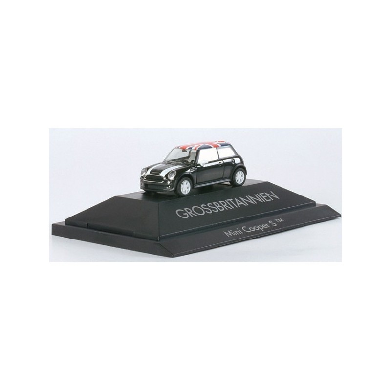 Model redukcyjny Mini Cooper S, skala 1:87, Herpa. Czarny samochód z czerwonym dachem, tablica "Grossbritannien".