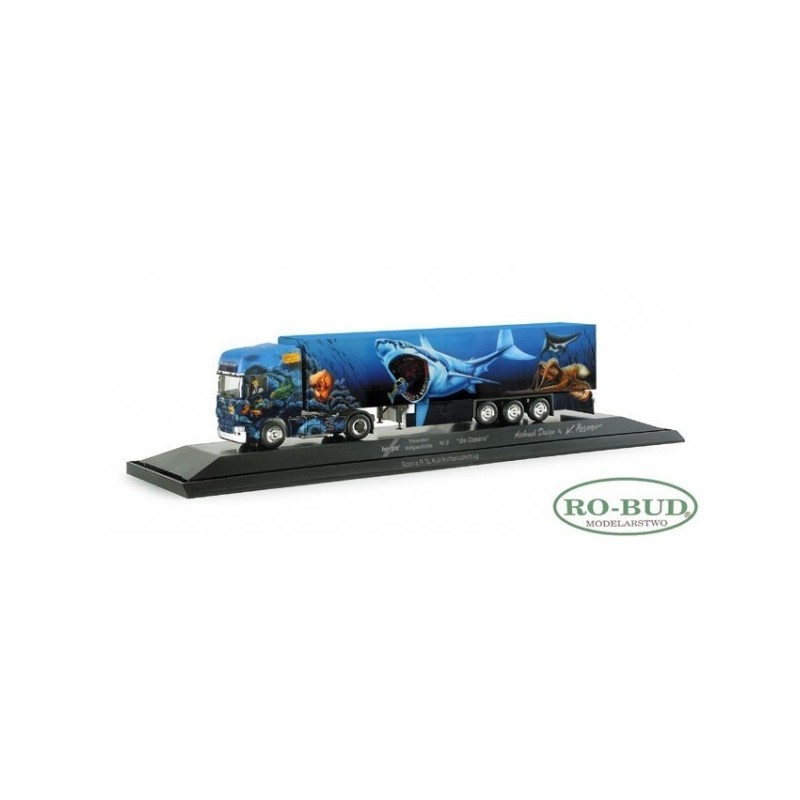 Model Scania R TL, skala 1:87, Herpa. Błękitna naczepa z ilustracją oceanu i ryb.