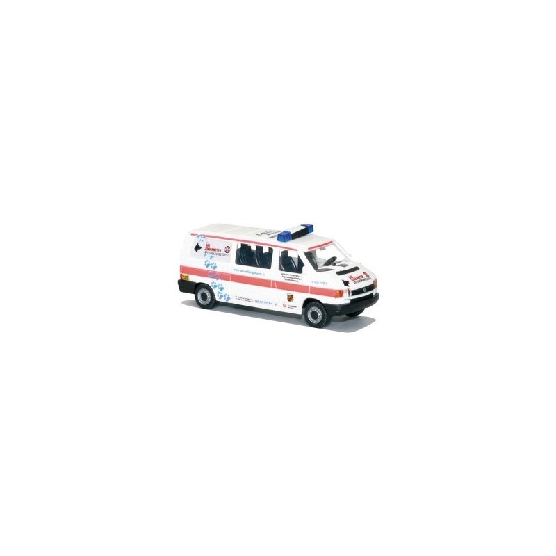 Model redukcyjny VW T4 LR JUH Rettungshunde, skala 1:87. Biała karetka z czerwonym paskiem i niebieskimi psimi śladami.