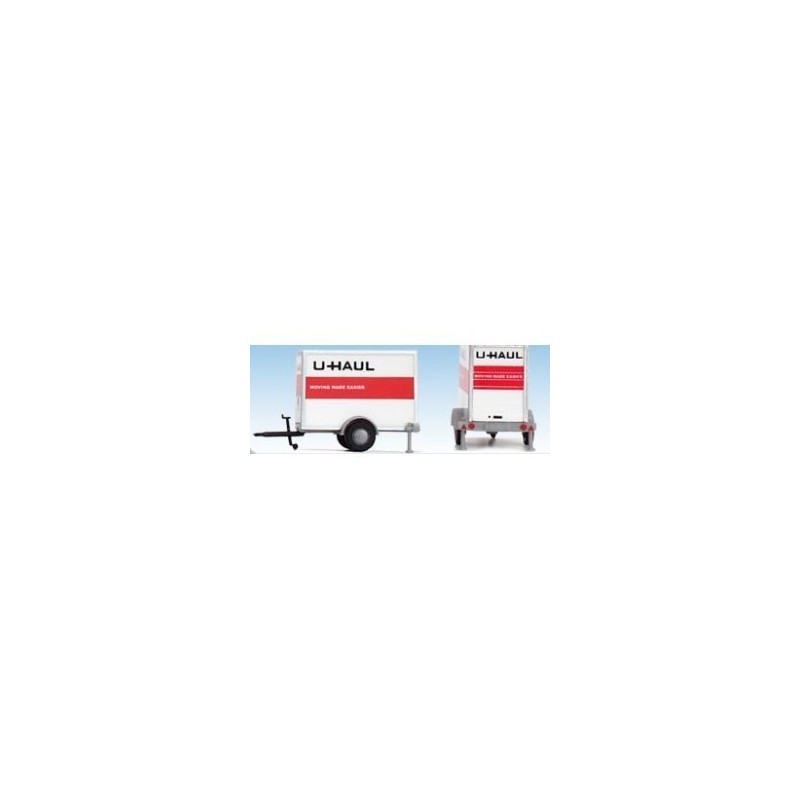 Model redukcyjny przyczepy UHAUL, skala 1:87. Biała z czerwonymi detalami.