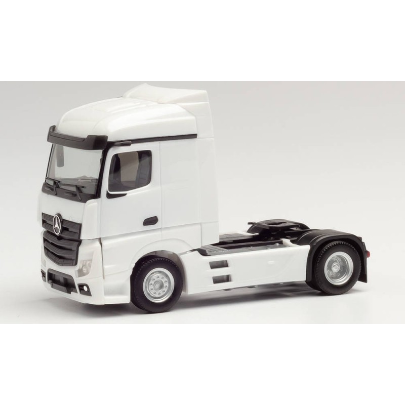 Model redukcyjny Mercedes-Benz Actros, skala nieokreślona, Herpa. Biały ciągnik siodłowy.