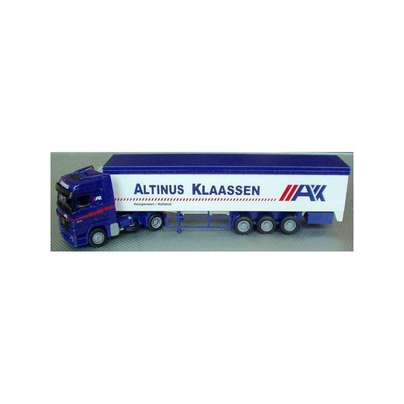 Model redukcyjny MB Actros, skala 1:87, AWM. Niebieski ciągnik siodłowy z białą naczepą, logo Altinus Klaassen.