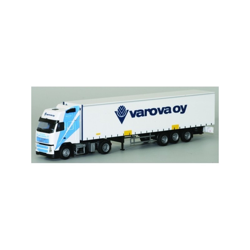 Model redukcyjny Volvo "NEU" XL / Aerop. - G-KSZ, skala 1:87, AWM. Ciężarówka z naczepą, biała i niebieska, logo "varova oy".