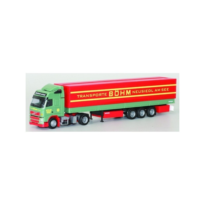 Model redukcyjny Volvo, skala 1:87, AWM. Zielony ciągnik siodłowy z czerwoną naczepą, logo "Transporte Böhm".