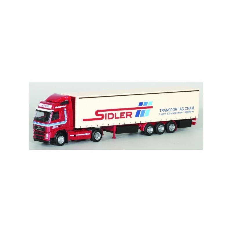 Model redukcyjny Volvo "NEU" / Aerop. - G-KSZ, skala 1:87, AWM. Czerwony ciągnik siodłowy z białą naczepą, logo Sidler.