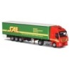 Model Iveco Stralis, skala 1:87, AWM. Zielona naczepa z logo SAE, czerwony przód.