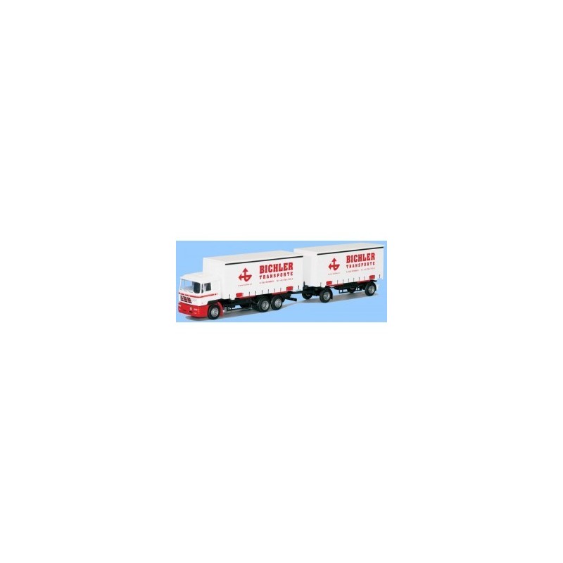 Model Steyr G-WKHZ, skala 1:87, AWM. Czerwono-biały, z naczepą Bichler Transporte.