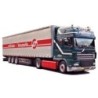Model DAF XF 95 SSC, skala 1:87, AWM. Ciemnozielony z białą i czerwoną naczepą, logo JTE Transport.