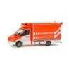 Model redukcyjny Mercedes-Benz Sprinter RTW "Essen fire department", skala 1:87, Herpa. Pomarańczowo-biały, oznaczenia straży po
