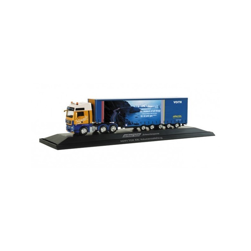 Model redukcyjny MAN TGX, skala 1:87, Herpa. Niebieska i żółta ciężarówka z naczepą "Steinle/Voith".