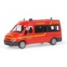 Model redukcyjny Ford Transit FW Klein Nordende, skala 1:87. Czerwony samochód strażacki z napisem "FEUERWEHR" i numerem "112".