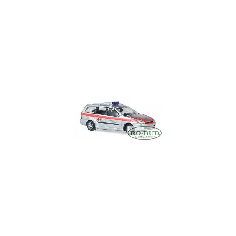 Model redukcyjny Ford Focus Turnier "DRK KV Weißwasser" w skali 1:87, Rietze. Biały z czerwonymi paskami, sygnały świetlne.