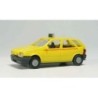 Model FIAT Tipo Taxi, skala 1:87, żółty z czerwonymi paskami, tablica TAXI.