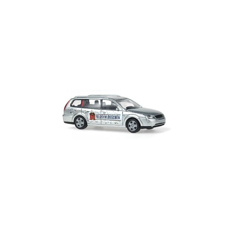 Model redukcyjny FORD Mondeo Turnier, skala 1:8, z reklamą Feldschlösschen Bier. Srebrny samochód z czarnym przodem.