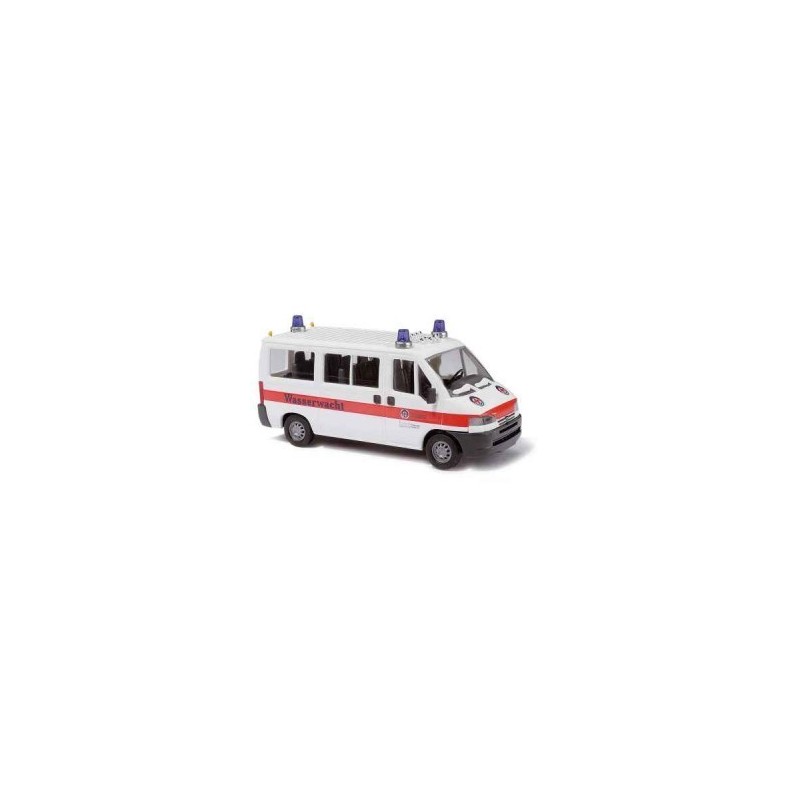 Model Peugeot Boxer BRK Wasserwacht, skala 1:87, z detalami i w czerwono-białym malowaniu.