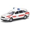 Model redukcyjny VW Passat Var.Malteser, skala 1:87. Biały z czerwonymi pasami, napis Malteser.