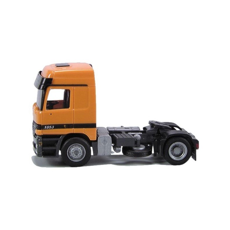 Model redukcyjny Mercedes Actros L/HD, skala 1:87, bez naczepy. Pomarańczowa kabina, czarne podwozie.
