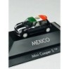 Mini Cooper S "Mexico" skala 1:87, HERPA. Czarny z białymi paskami i deską surfingową z flagą Meksyku.