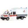 Model redukcyjny FORD Transit Rode Kruis, skala 1:87. Biały samochód z czerwonym paskiem i logo Czerwonego Krzyża.
