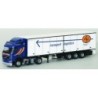 Model redukcyjny Volvo FH Globetrotter, skala 1:87, AWM70487. Niebieska kabina, biała naczepa z logotypem "ASC" i napisem "trans