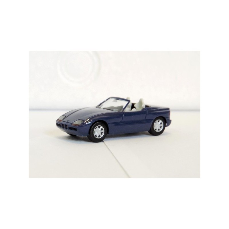 Model redukcyjny BMW Z1, skala 1:87, Herpa. Ciemnobłękitny kabriolet, białe wnętrze.