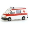 Model redukcyjny Ford Transit Sondereinsatzgruppe, skala 1:87, biało-czerwony, napis Sondereinsatzgruppe, czerwony krzyż.