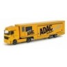Model redukcyjny Mercedes-Benz Actros, skala 1:87, Herpa. Żółty samochód ciężarowy z naczepą, logo ADAC Nordbayern.