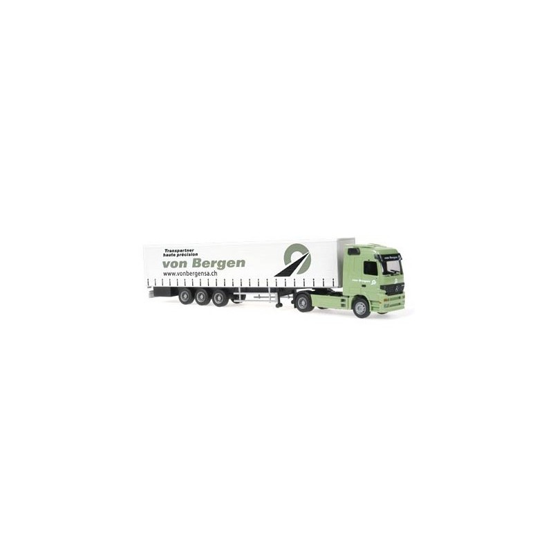 Model redukcyjny MERCEDES-BENZ Actros, skala 1:87, Von Bergen. Zielony ciągnik siodłowy z białą naczepą.