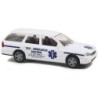 Model redukcyjny FORD Mondeo Turnier Taxi-Ambulances, skala 1:87, biały z niebieskimi paskami i logotypem.