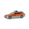 Model redukcyjny BMW 5 Touring, skala 1:87, Herpa. Policyjny samochód z napisem "POLIZEI", sygnałem świetlnym na dachu.