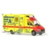 Model redukcyjny karetki MB Sprinter, skala 1:87, Wietmarscher. Żółto-czerwony, logotypy AW Wiesbaden.