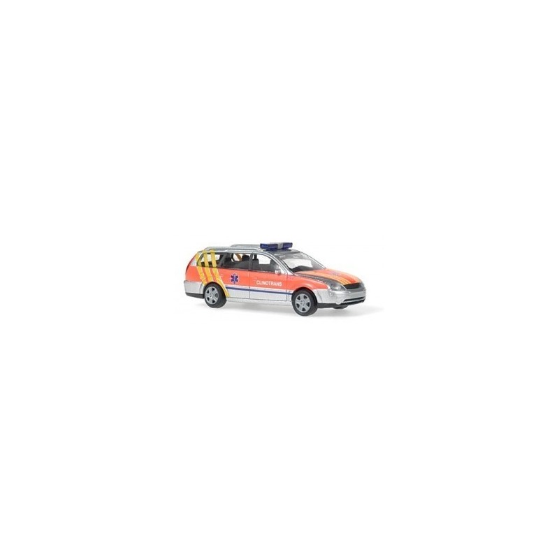 Model redukcyjny FORD Mondeo Turnier, skala 1:87, Clinotrans. Pomarańczowy ambulans z niebieskimi światłami.
