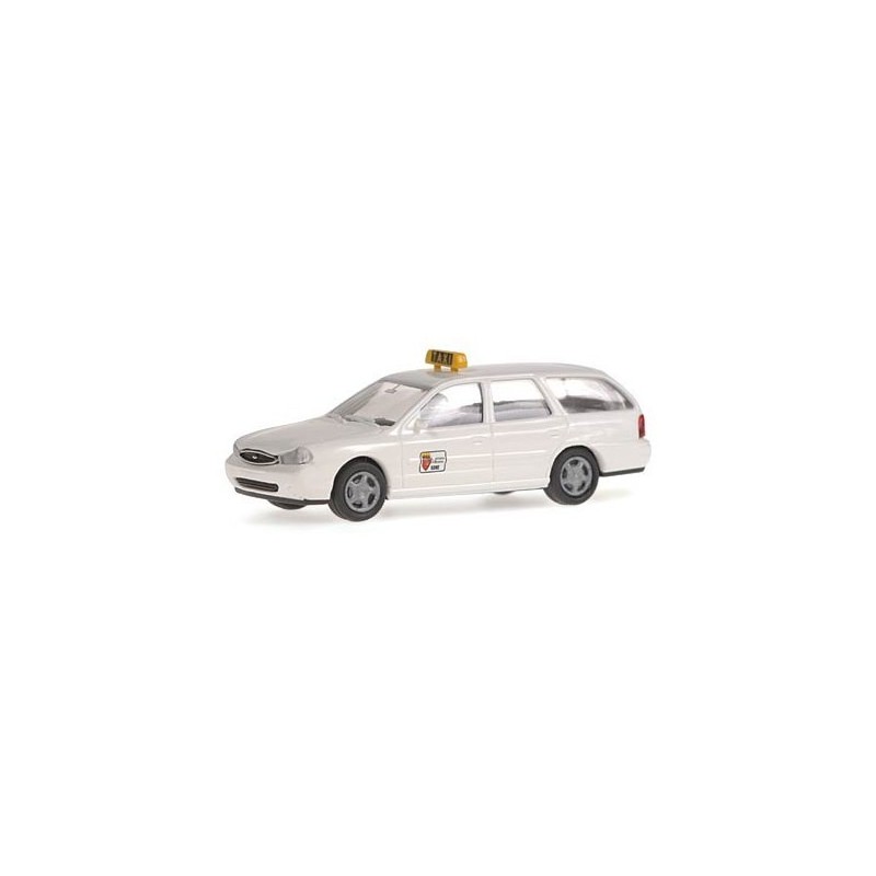 Model redukcyjny FORD Mondeo Turnier "Taxi Roma", skala 1:87. Biały samochód z sygnalizacją, logo Taxi-Ambulances.